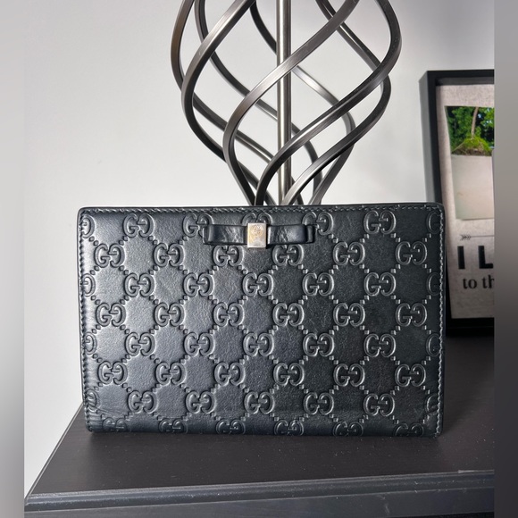 Gucci Handbags - Gucci Black Guccissima Leather Bow Flap Wallet / clutch